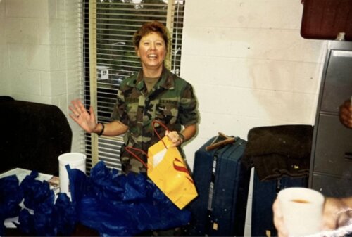 LTC Collins-Davis unpacking medical supplies.